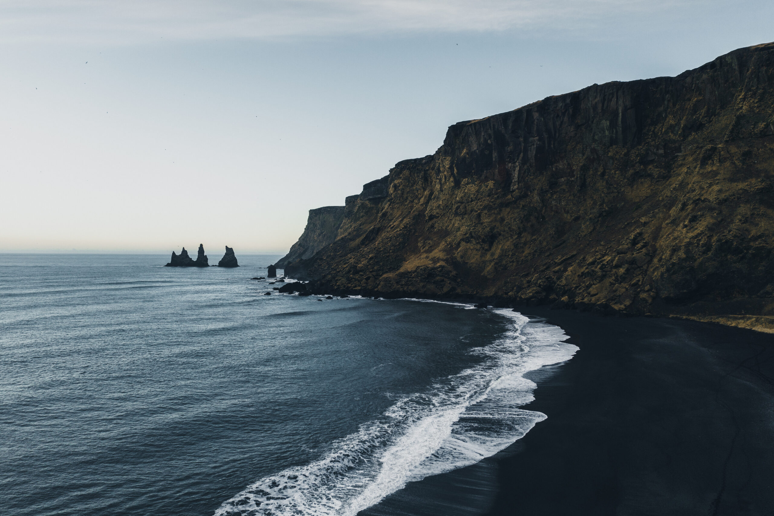 Scenic aerial view of black sand beach  in Iceland