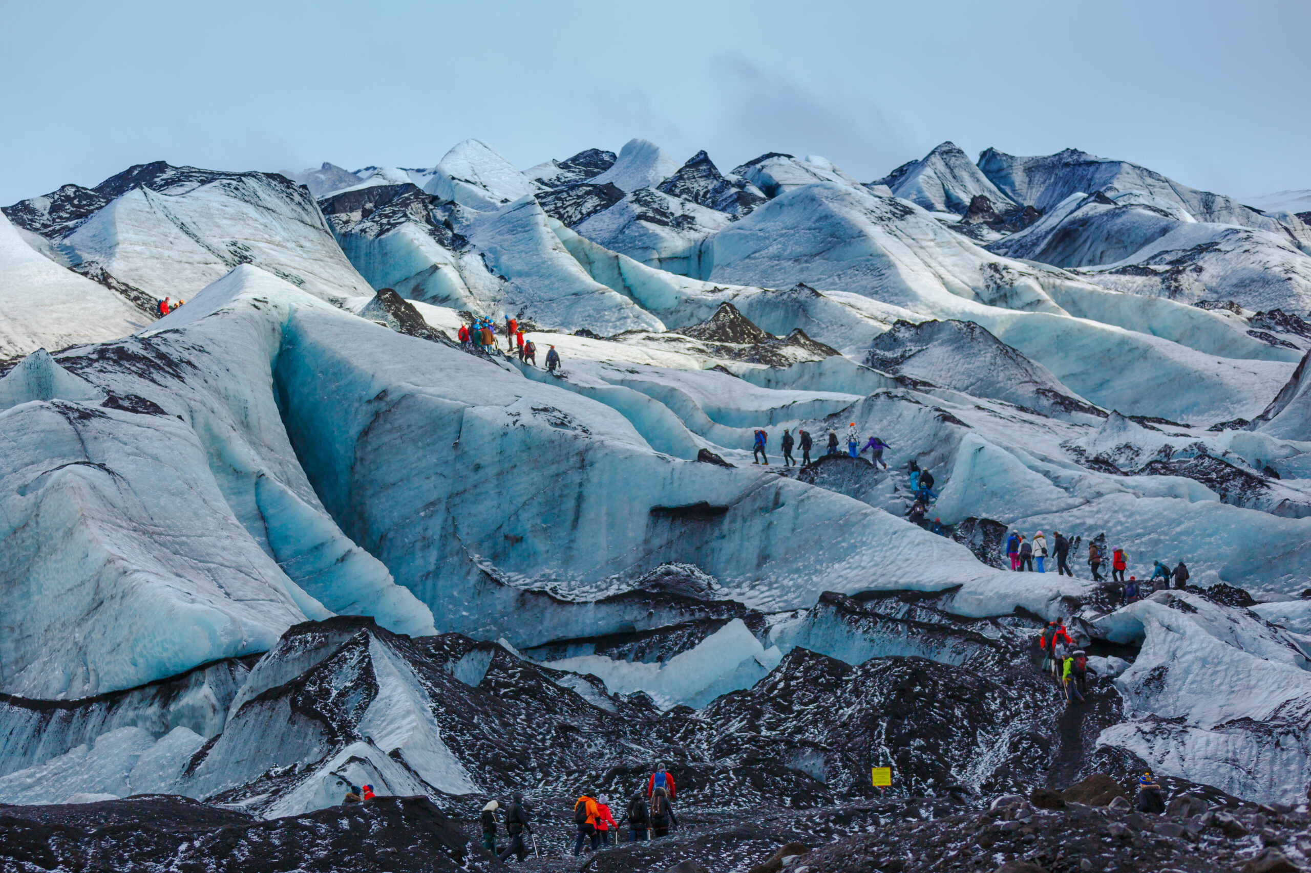 Private,Guide,And,Group,Of,Hiker,Walking,On,Glacier,At