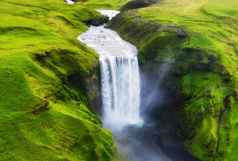Aerial view on the Skogafoss waterfall in Iceland. Landscape from air. Famous place in Iceland