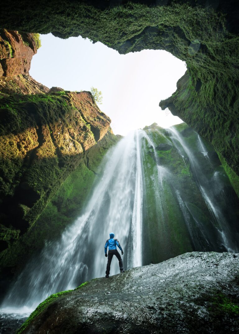 Man,In,The,Cave,Near,The,Gljufrabui,(gljufrafoss),Waterfall,,Iceland,